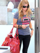 Fergie with a red Wilm handbag tote by Le Petitpas